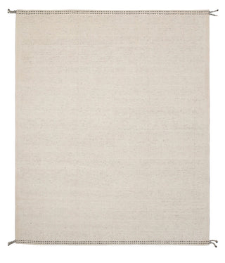 Beige woven rug on a wooden floor with dimensions displayed.